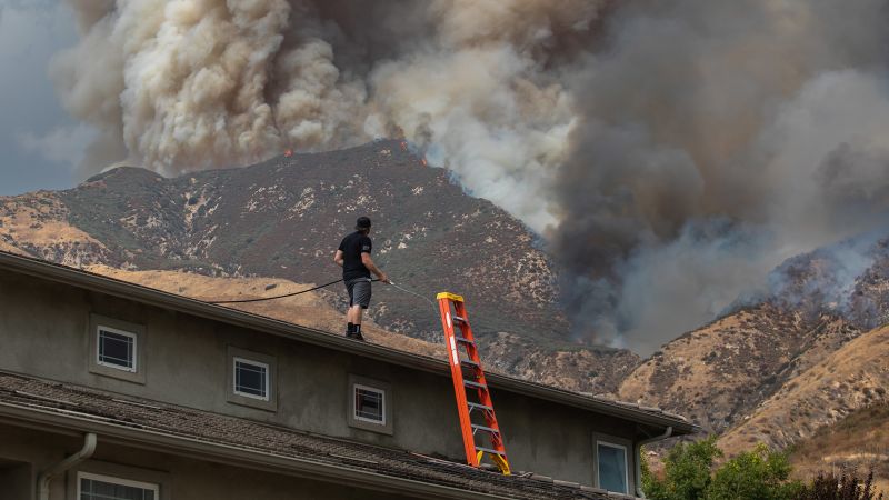 Residents flee as California and Nevada wildfires get dangerously close and forecasters warn of record heat | CNN